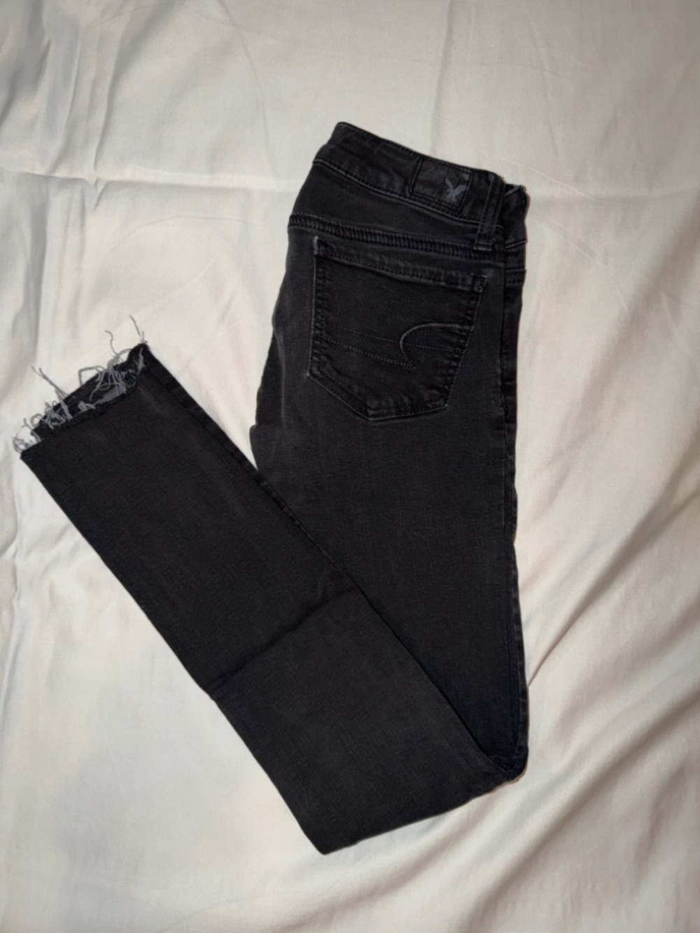 American Eagle‎ Black Distressed Skinny Jean With Raw Hem